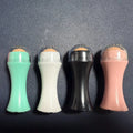 Portable volcanic stone roller for oily skin control in black, green, pink or white