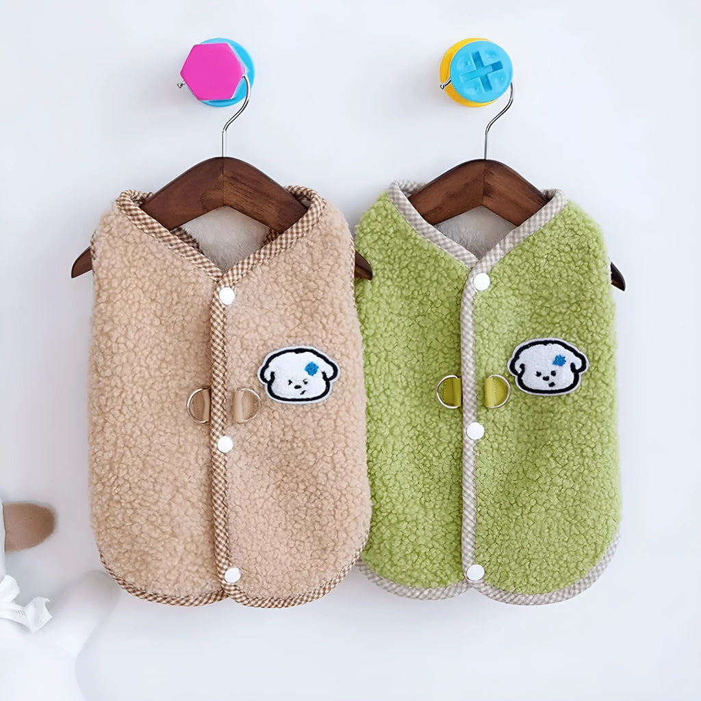 Green fleece dog vest with a metal leash ring on the back, for small pets.