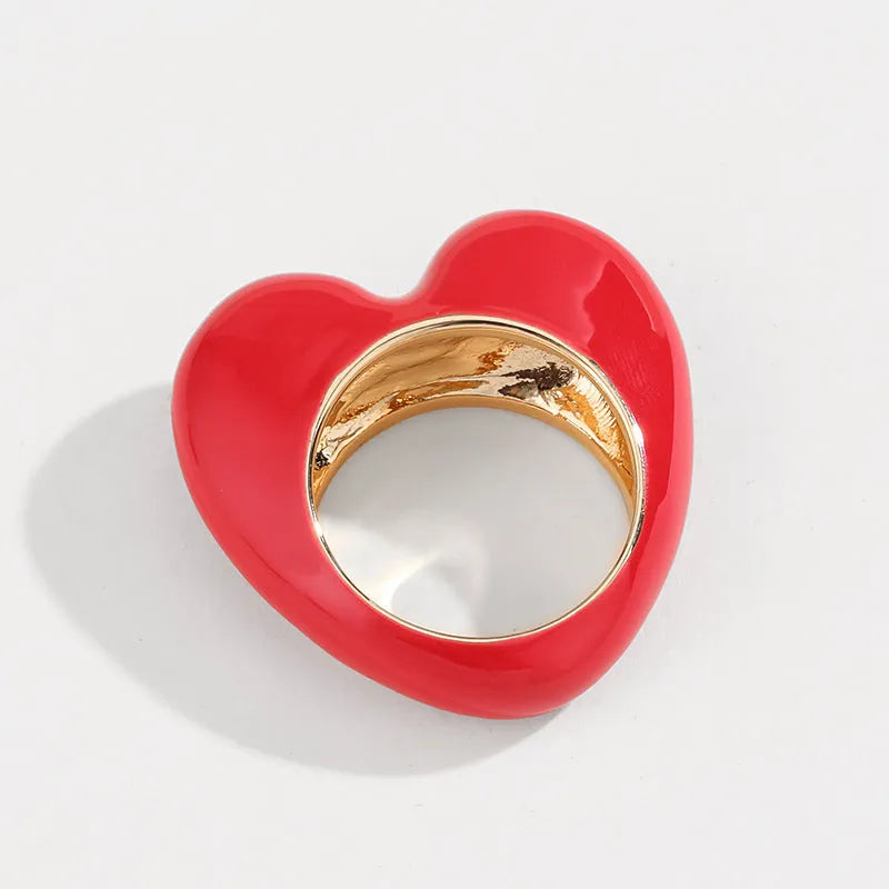Heart-shaped ring with raised three-dimensional enamel detailing in a choice of colours