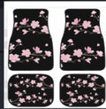 Black printed rubber car foot mat set showing textured surface and raised edges.