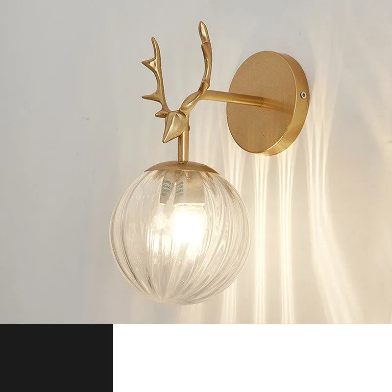 Nordic style round glass wall lamp with golden water pattern finish and E27 bulb holder.