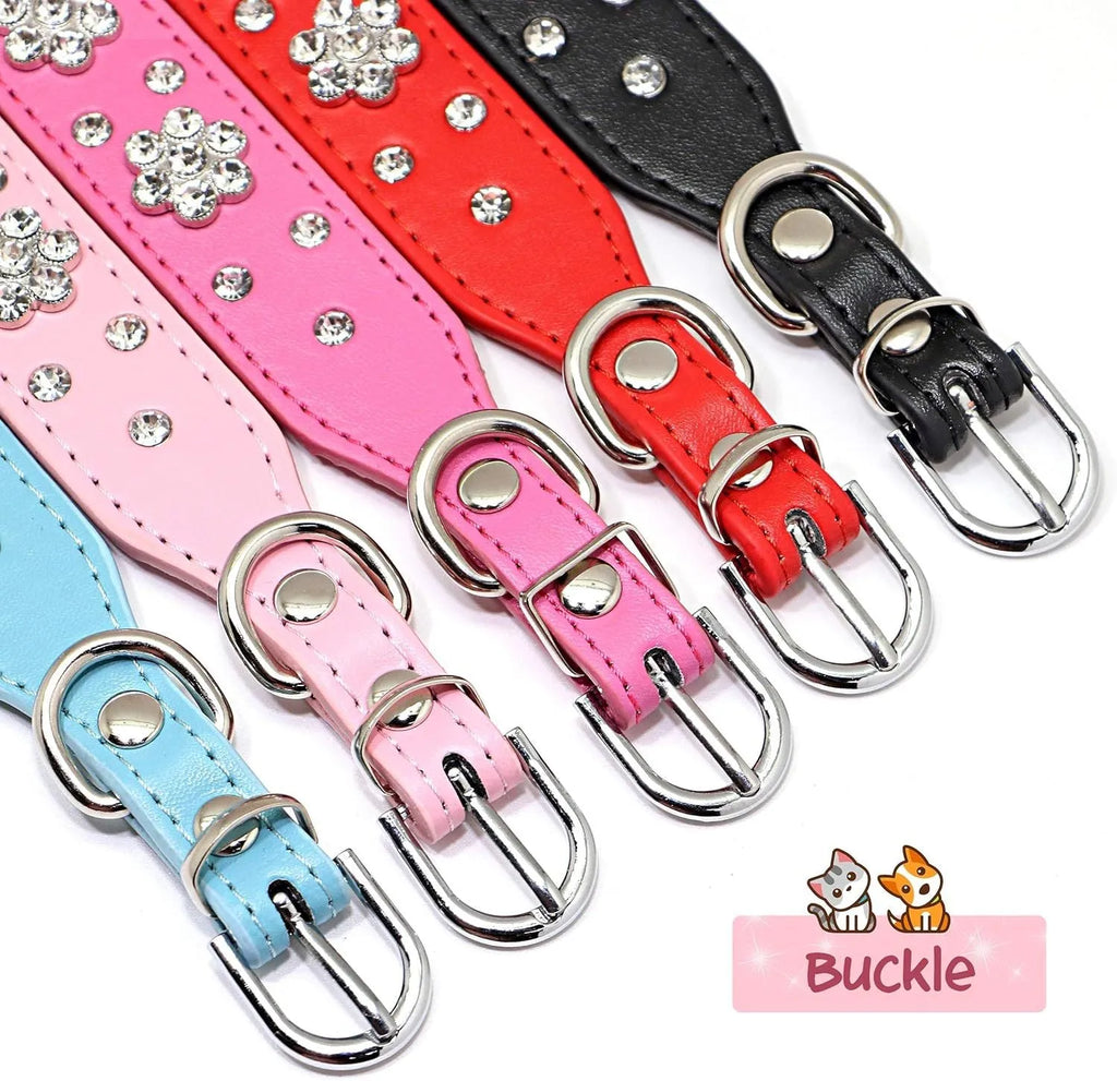 Soft black PU leather dog collar with sparkling pink rhinestone flower studs and a metal D-ring.