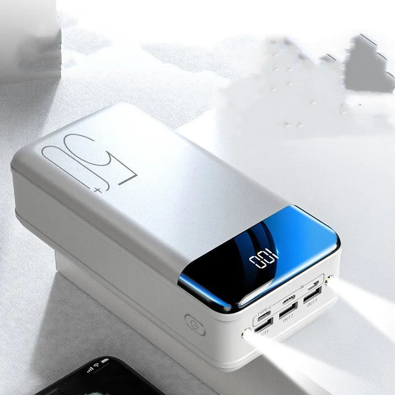 Black and white large capacity 50000mAh power bank with multiple USB ports.