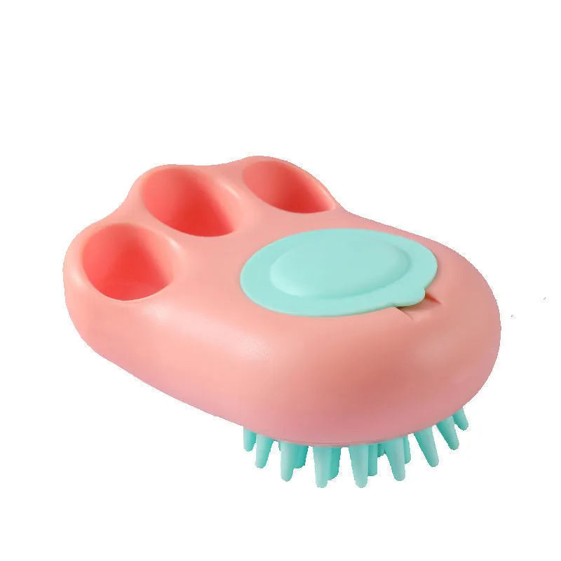 Multi-colour plastic pet bath brush with bristles on one side and a cat claw comb design on the reverse.