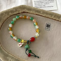 M990 Lotus Ruyi bracelet with lotus decoration and mixed materials