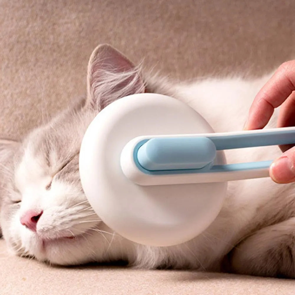 Automatic pet grooming comb with stainless steel teeth, ABS handle, and button release in blue, green, or pink colours