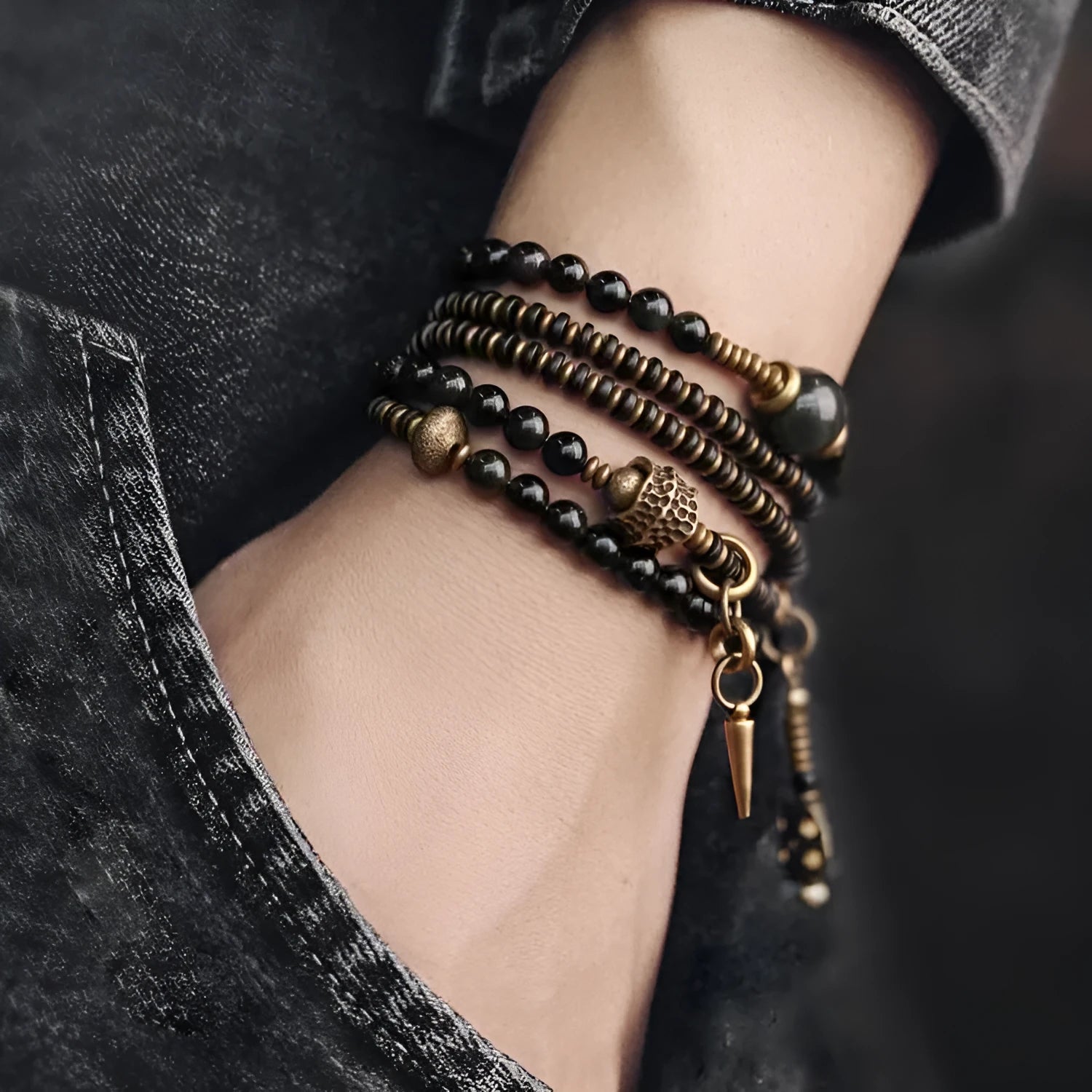 Black geometric beaded bracelet with multi-layered construction