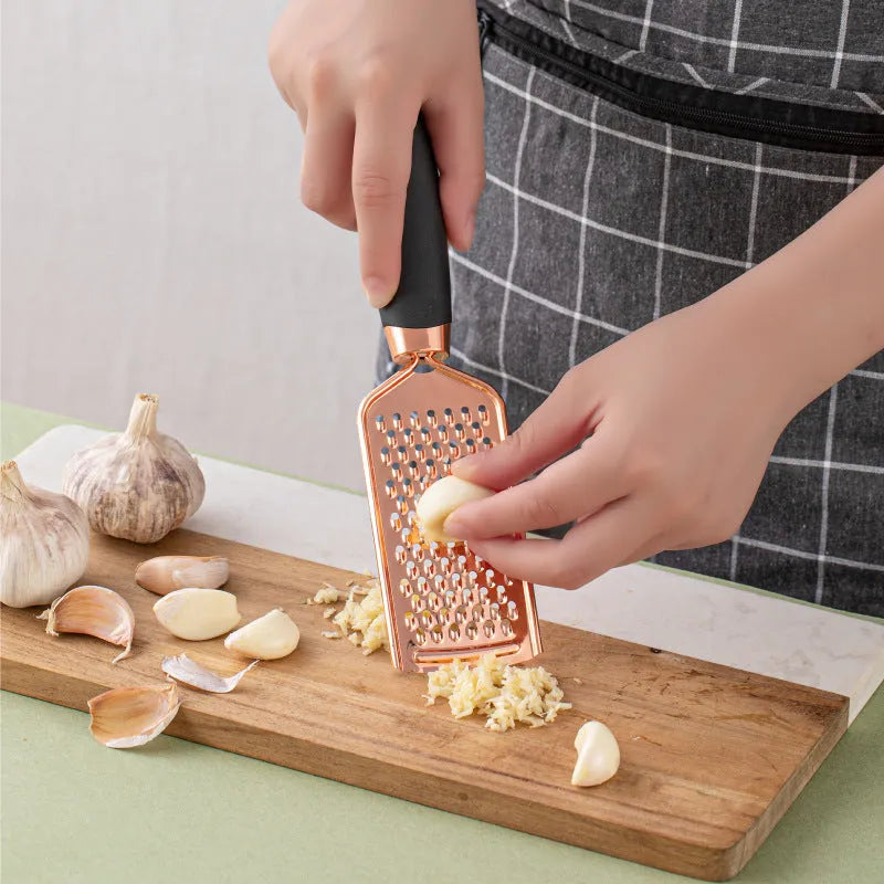Rose gold plated stainless steel 7-piece kitchen tool set with cutlery rack in mint green colour