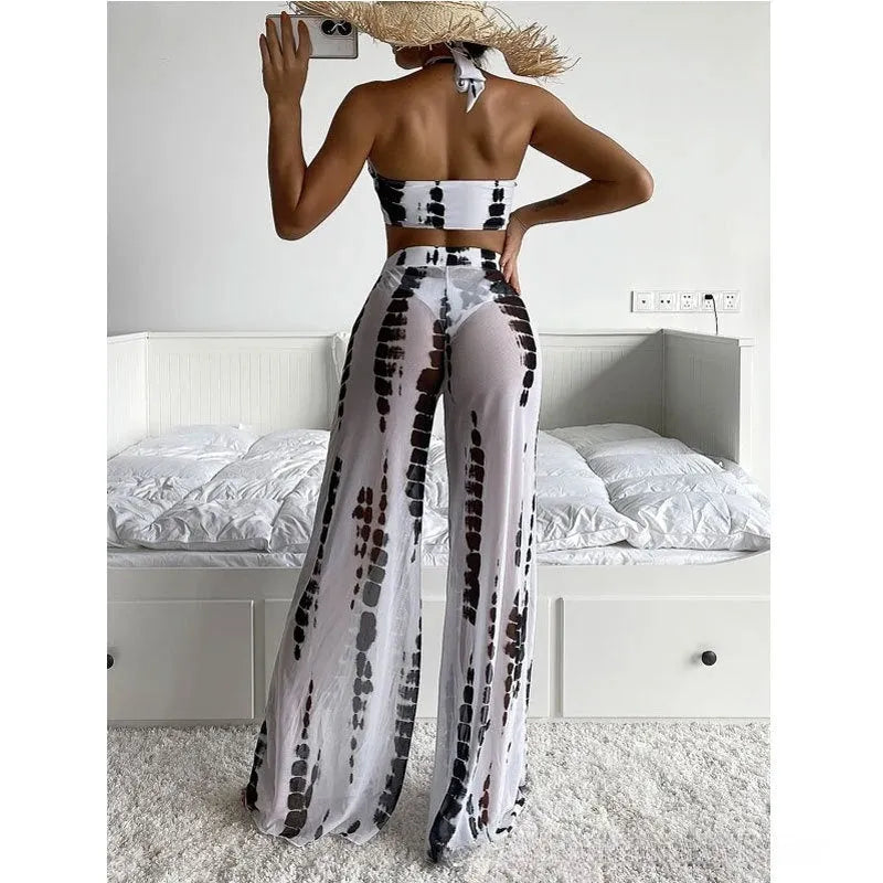 Three-piece women's bikini swimsuit set with mesh trousers in black or blue printing
