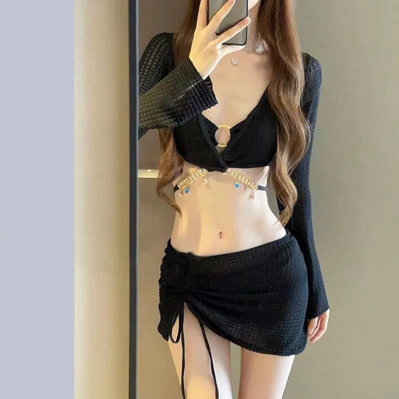 Women's black long sleeve bikini swimsuit for swimming and hot spring use