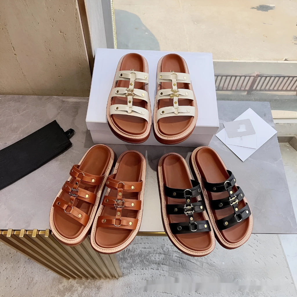 Women's white patent leather Roman sandal slippers with sheepskin lining, shown from the side.