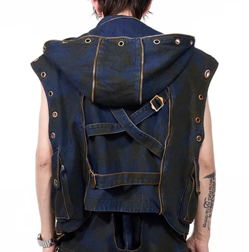 Blue hooded denim vest coat and matching trousers set on a model