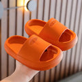 Mixed colour children's EVA slippers with a non-slip, wear-resistant sole, shown in multiple size options.