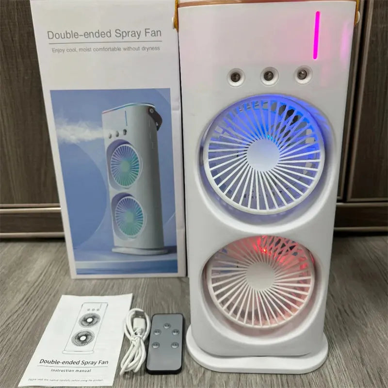 White portable humidifier fan with two spray heads, remote control, and coloured LED lights on a desk.