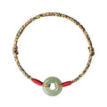 Colourful braided rope bracelet with peace buckle closure on woven design