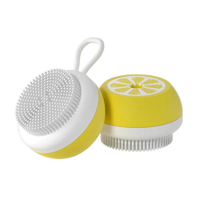Yellow silicone pet bath brush with soft bristles for dog and cat grooming during bathing
