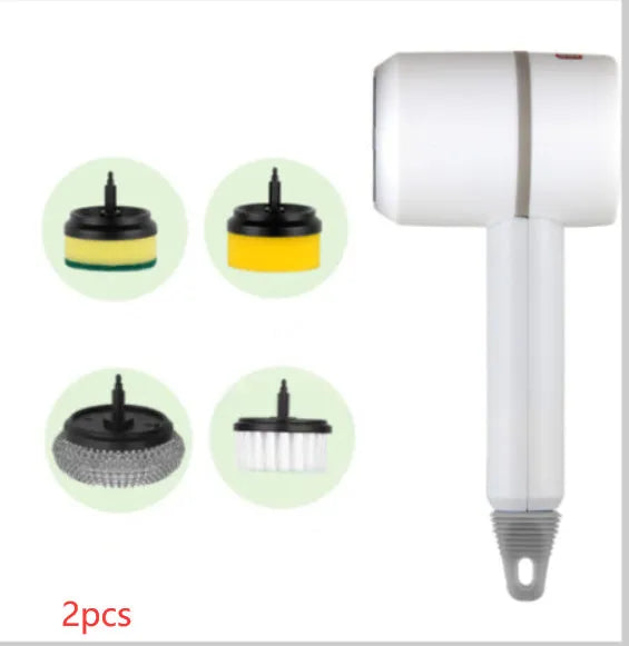 White rechargeable electric cleaning brush with multiple scrubber heads on a kitchen worktop.