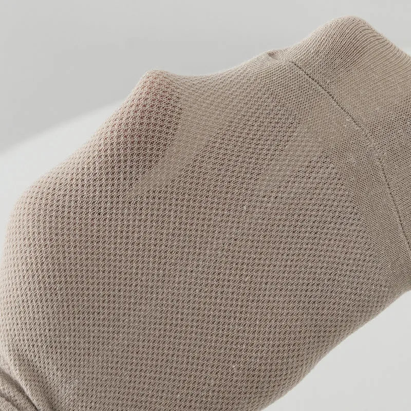 A pair of solid colour low-cut polyester boat socks laid flat, showcasing their simple design and one of the six available colour variants.