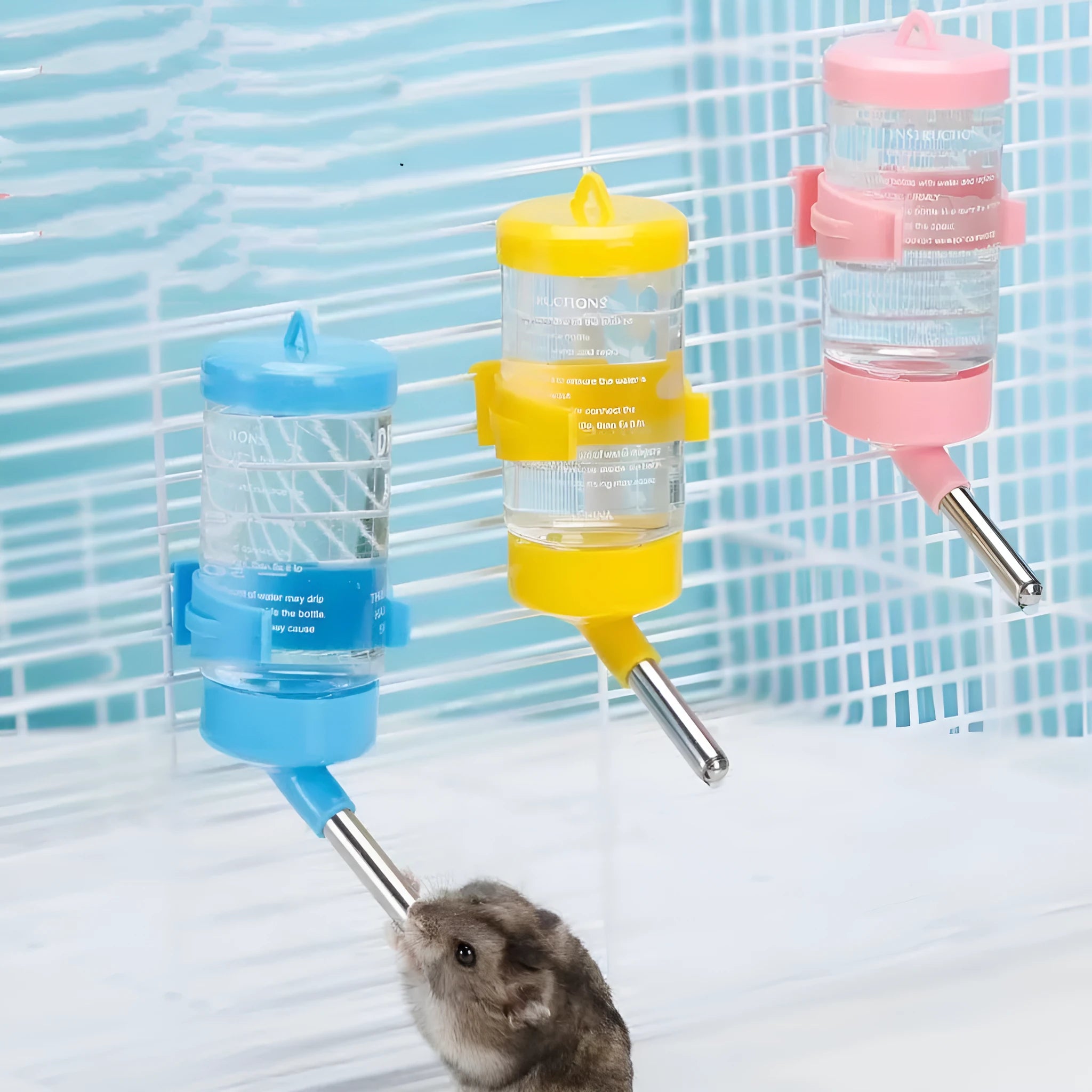 Green plastic ball kettle water feeder for small pets with metal spring clip, shown in 250ml size.