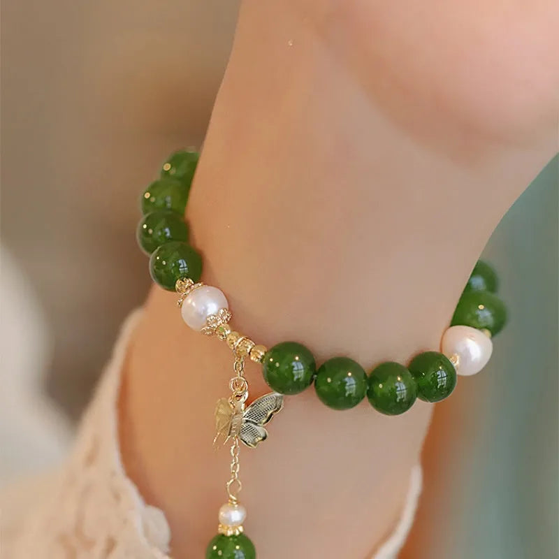 Green chalcedony bracelet with geometric shaping and round decorative elements