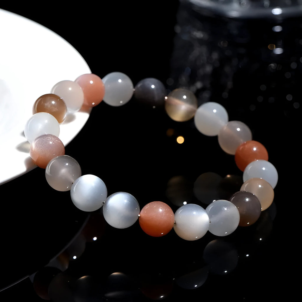 Natural colourful moonstone bracelet with a single 8mm bead on a cord.