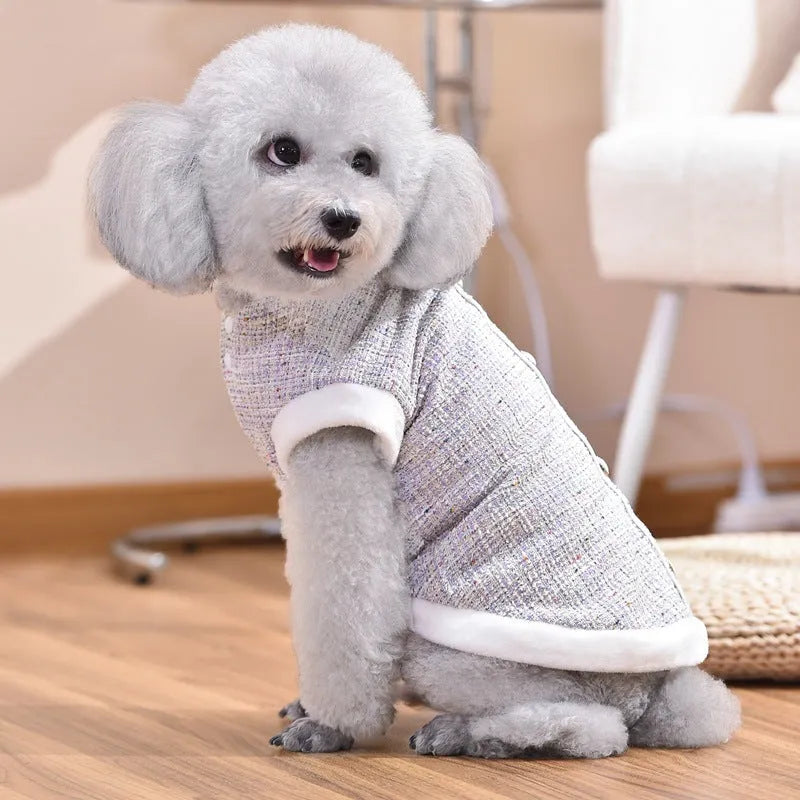 Black sausage jacket costume for cat on mannequin showing PU material and size tag