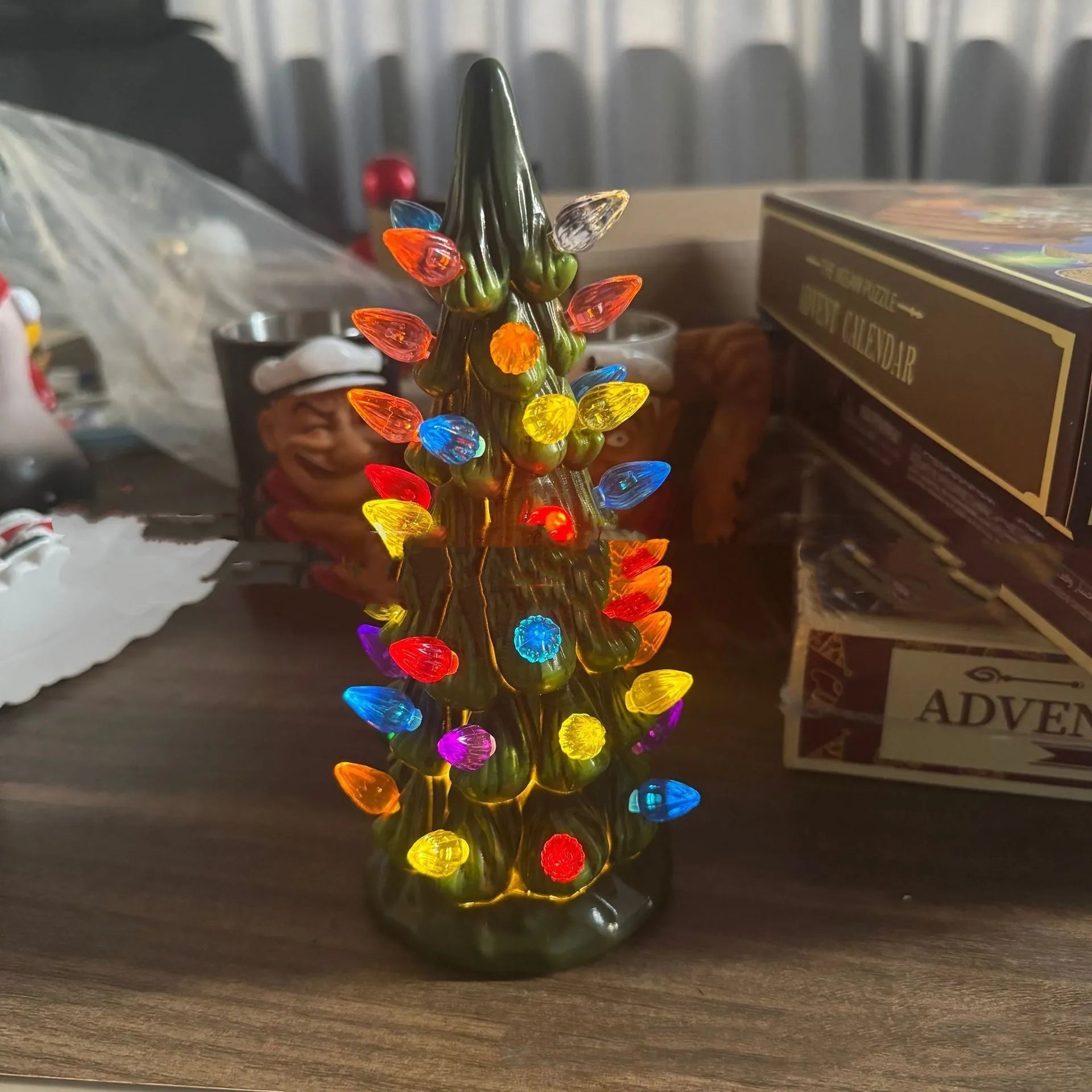 European style resin Christmas tree decoration with lights in 20cm, 25cm, or 30cm size for courtyard use.