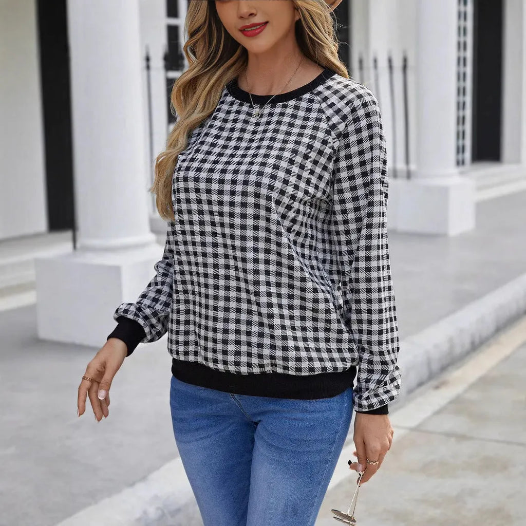 Black pullover sweater with Japanese plaid and printed stripe patterns, long sleeves