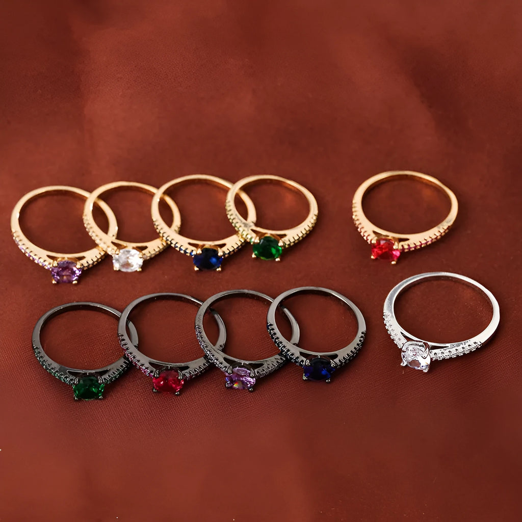 A geometric hexagonal zircon ring in a copper electroplated finish, shown in a gold rose red colour.