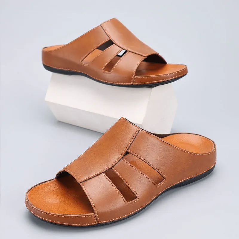 Men's outdoor beach flip flops in khaki colour with PU leather upper on sand