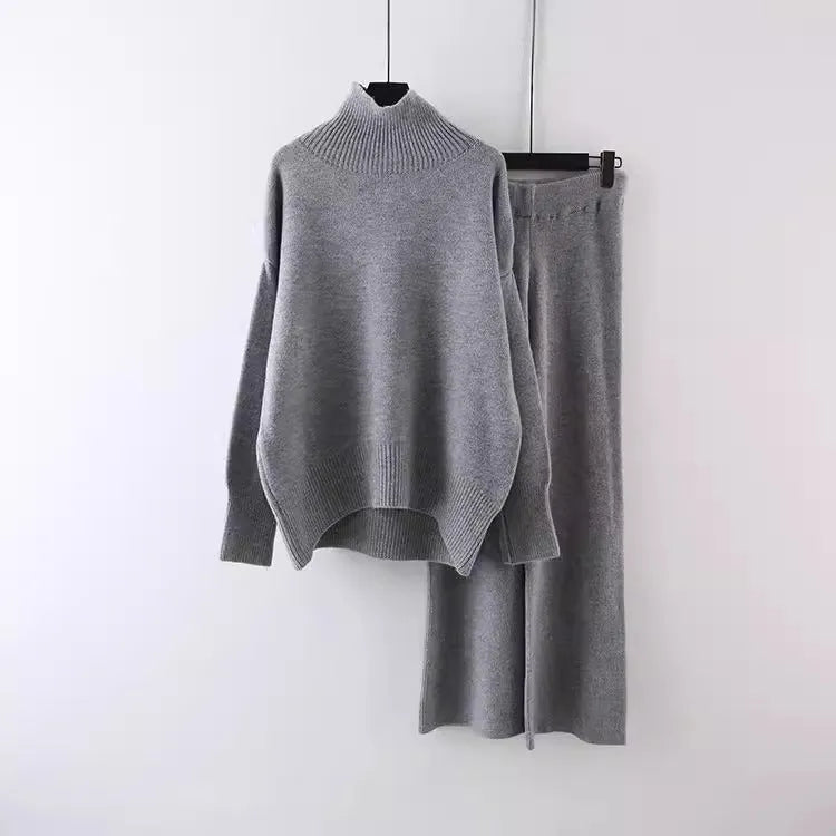 Women's casual two-piece set featuring a long-sleeve sweater and wide-leg trousers in a solid colour.
