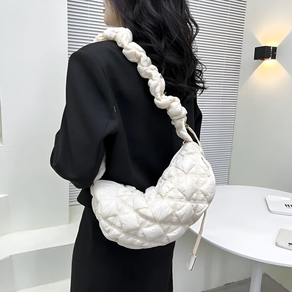 Women's nylon underarm shoulder bag in beige colour showing front view with adjustable strap