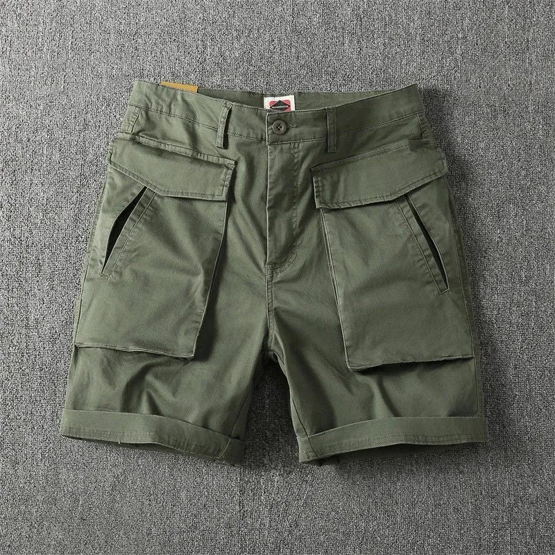 Men's straight-leg cargo shorts in stretch cotton fabric, shown in army green colour with multiple pockets.