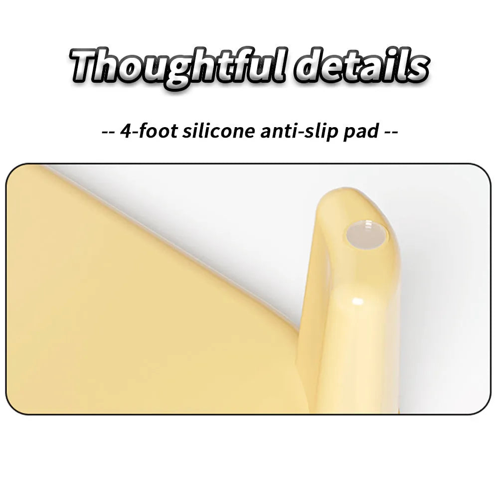 Milk yellow double-layer cat litter mat with anti-slip silicone feet on a floor