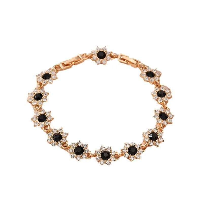Flower-shaped zinc alloy bracelet with electroplated finish and colourful crystal accents