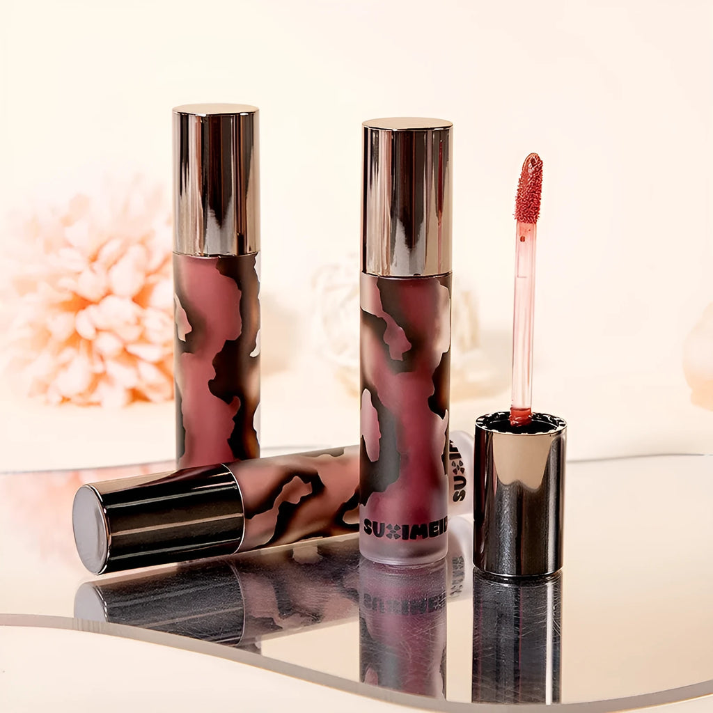 Lava Secret Matte Lip Mud Lipstick tube in shades orange brown coffee, cool grey, cinnamon coffee, jujube red, smoked purple.