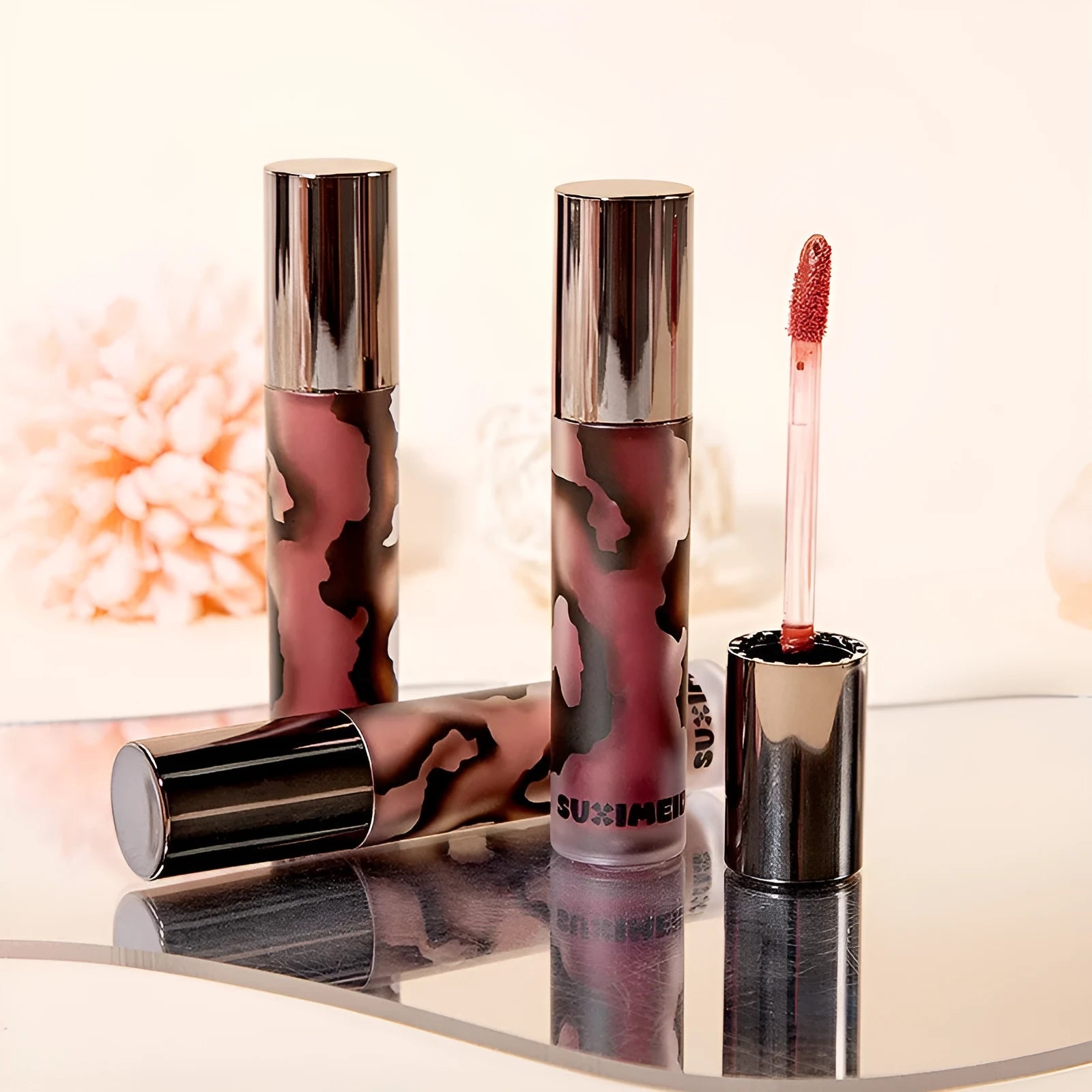 Lava Secret Matte Lip Mud Lipstick tube in shades orange brown coffee, cool grey, cinnamon coffee, jujube red, smoked purple.