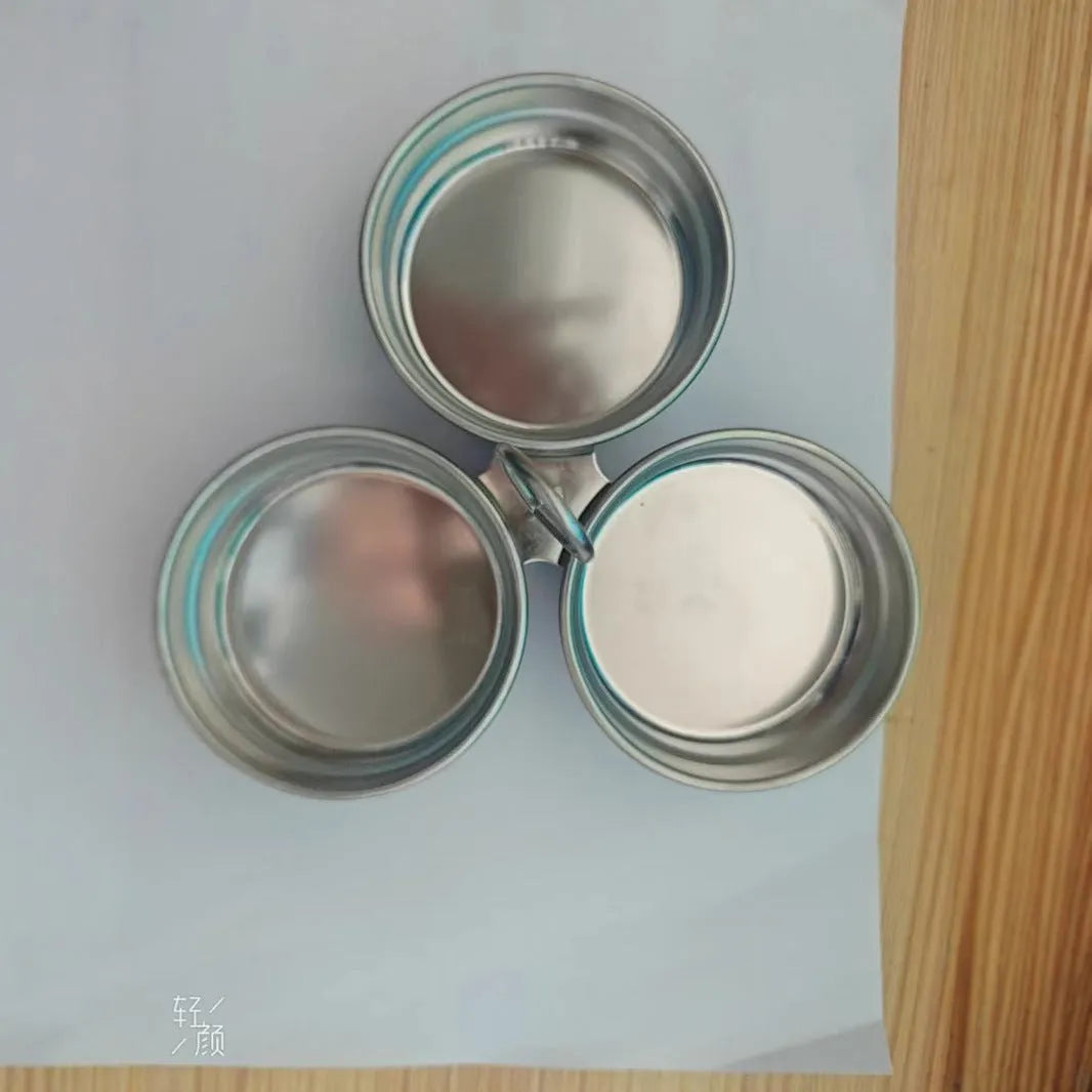 Stainless steel heart-shaped egg steamer with round mould option for compact breakfast preparation