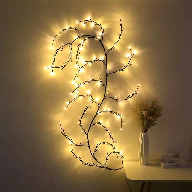 Flexible LED vine garland with warm white lights on birch bark texture branches