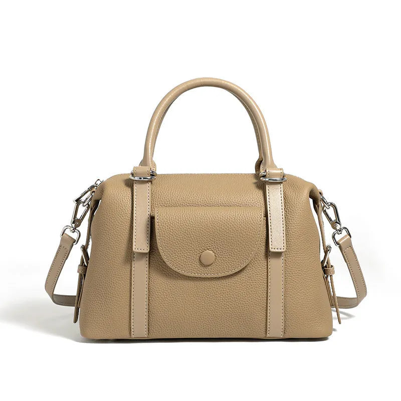 Genuine leather ladies' handbag in three colours with shoulder strap and lock fastener
