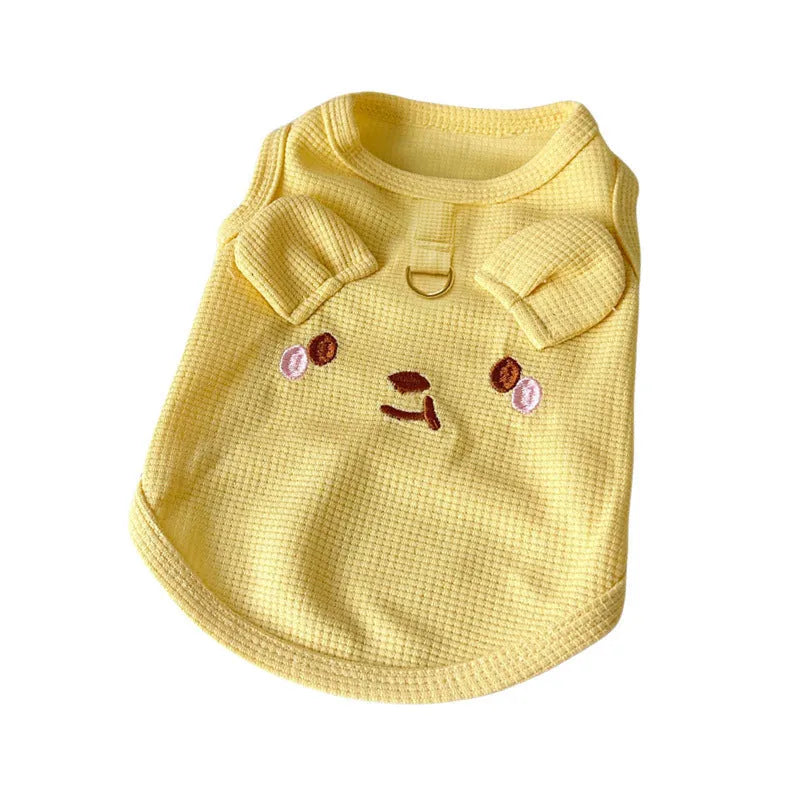 Yellow waffle weave dog vest on a mannequin showing casual style and sizing.