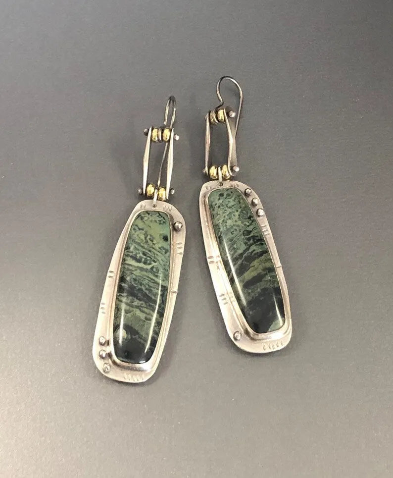 Geometric alloy earrings with two-colour marble pattern on simple drop design