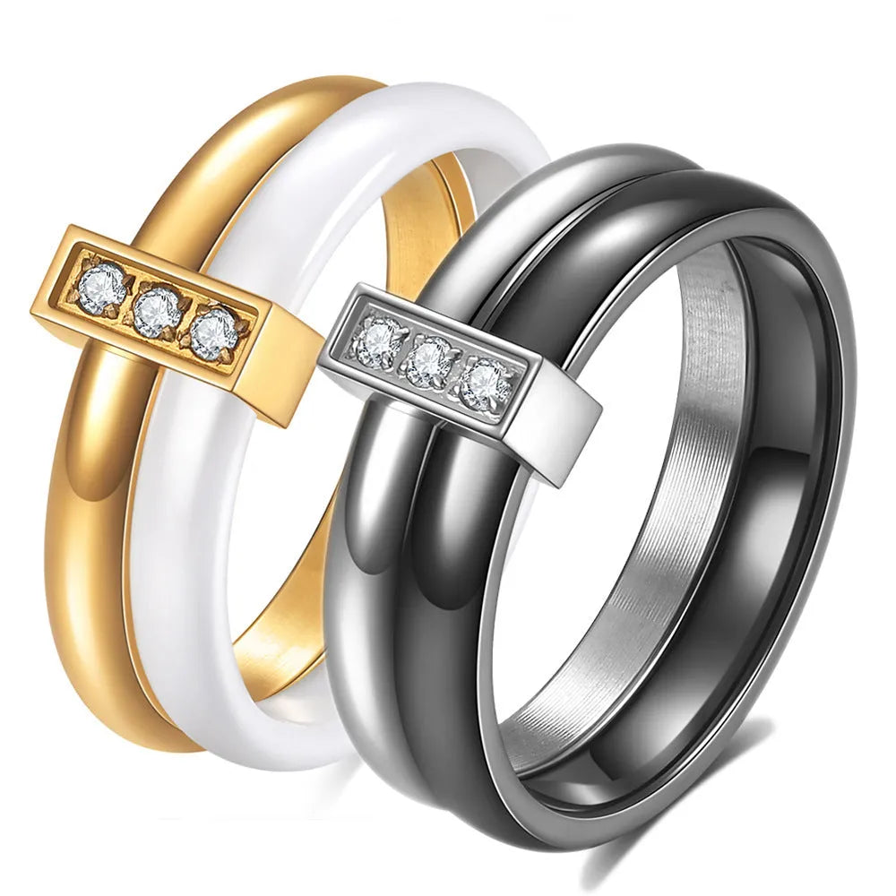 Geometric ceramic women's ring with a round 6mm zirconia stone in steel black colour.