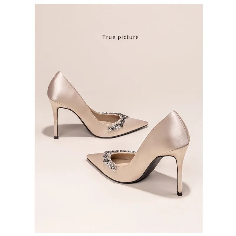 Women's black satin stiletto heels with rhinestone decoration and pointed toe