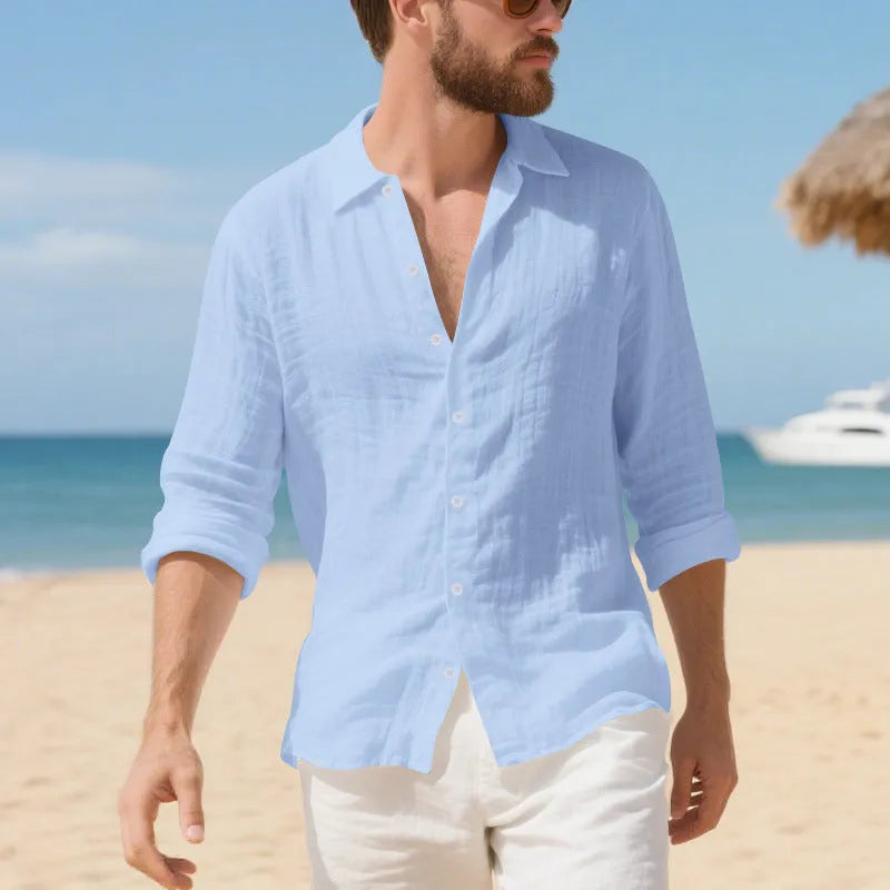 Linen casual shirt in a loose American fit on a hanger, shown in an earthy yellow colour.