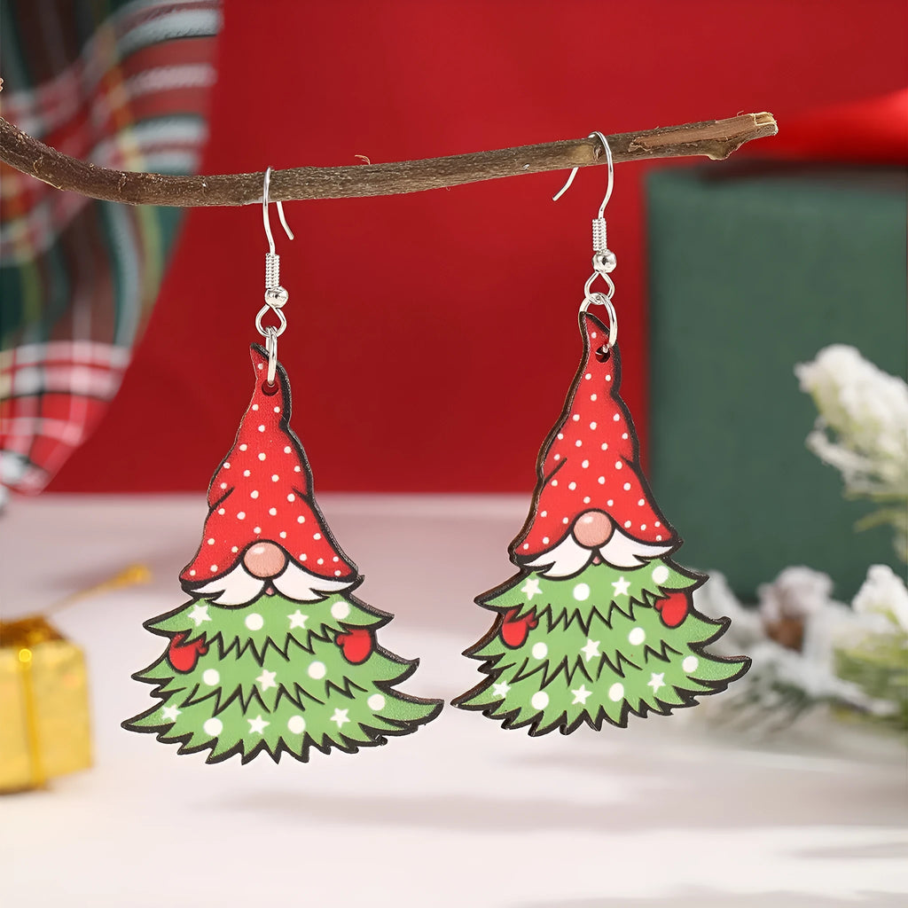 Wooden Christmas earrings with printed geometric designs featuring Christmas tree and snowman patterns