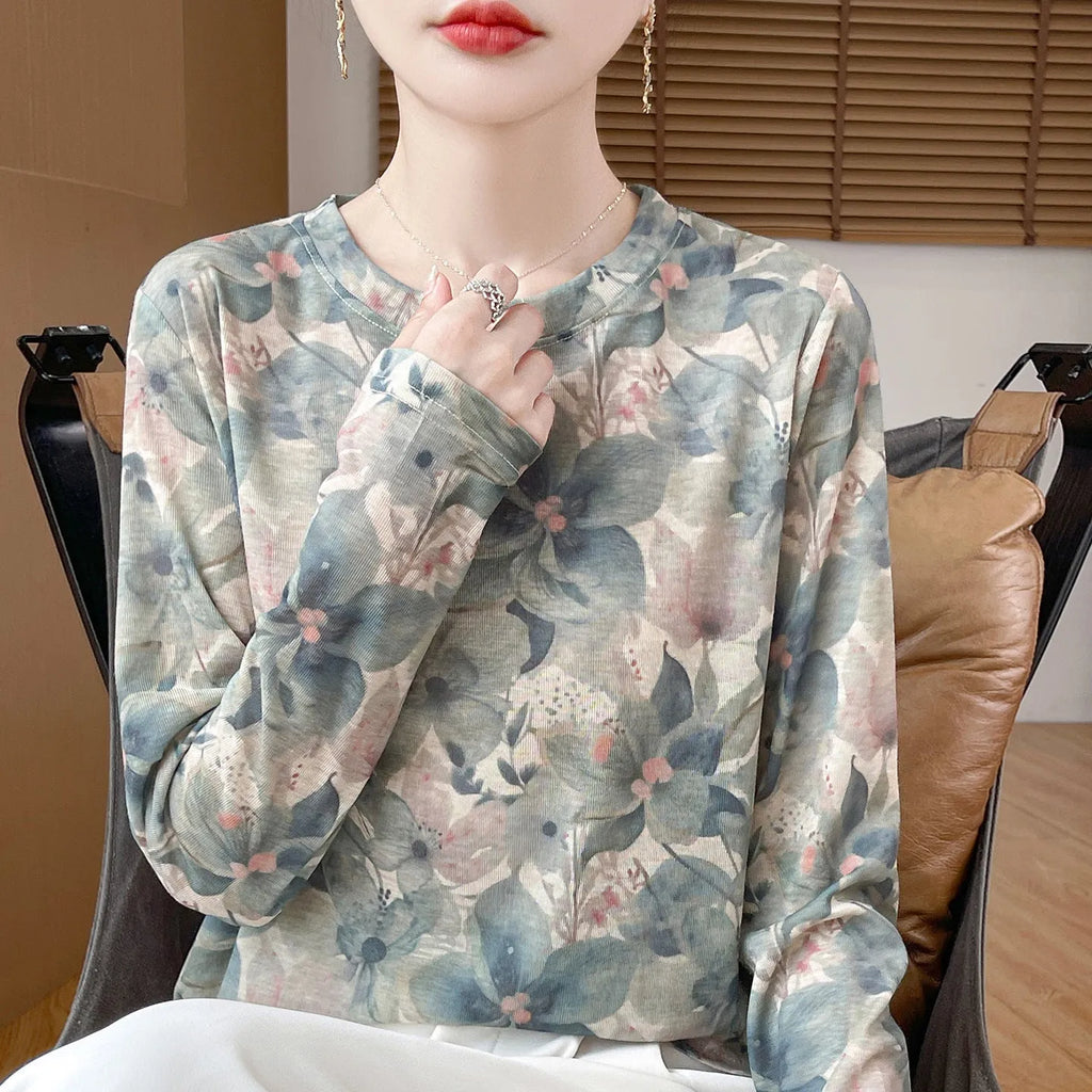 Women's round neck floral print pullover shirt in Tencel cotton fabric on a model.