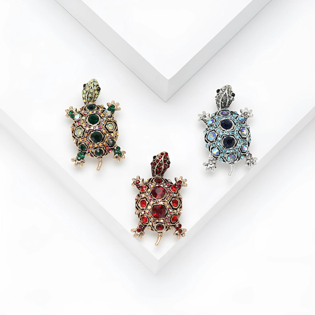 Retro style turtle brooch with rhinestone detailing in blue, green, or red colour options