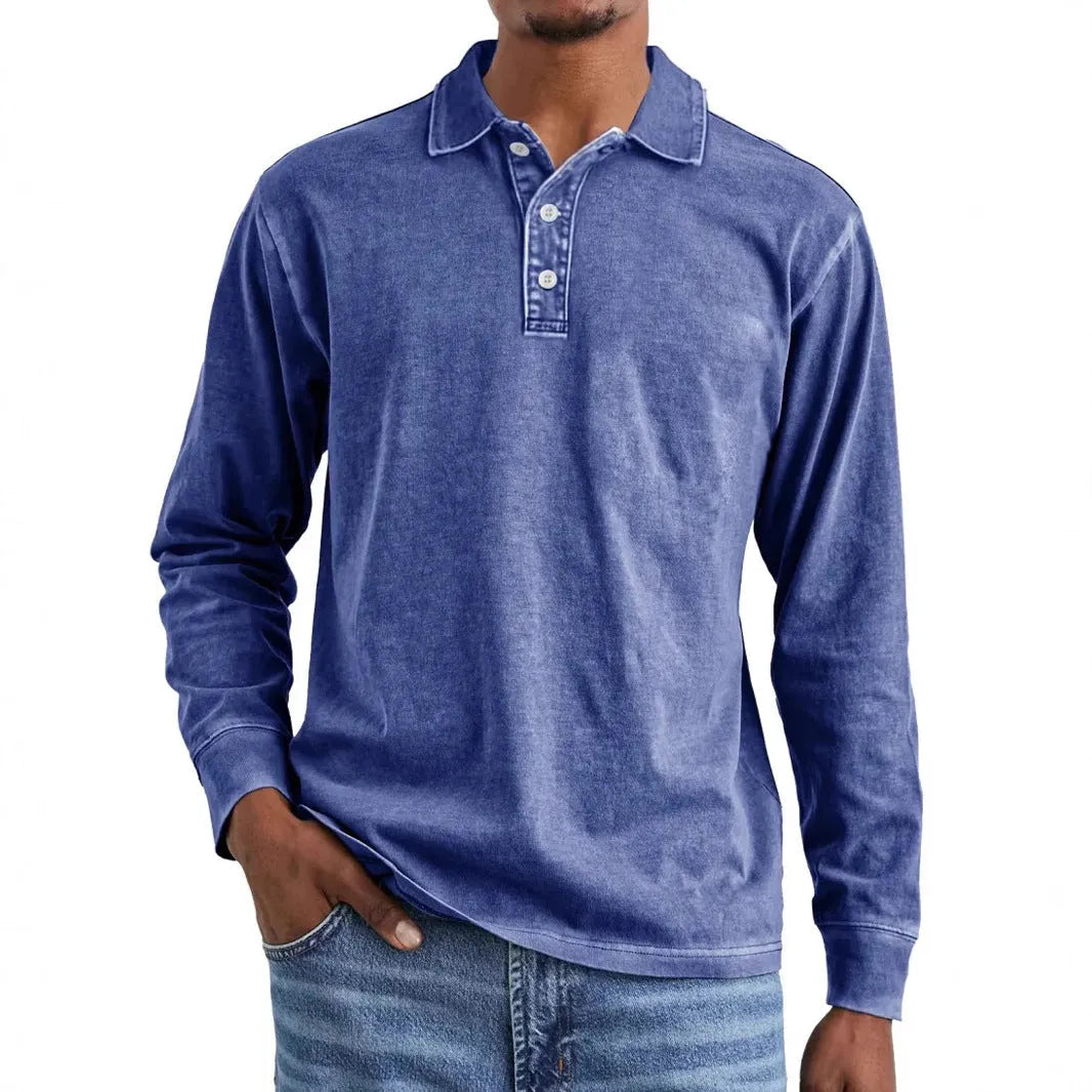 Man wearing a retro washed army green long sleeve polo shirt with a lapel collar and distressed detailing.