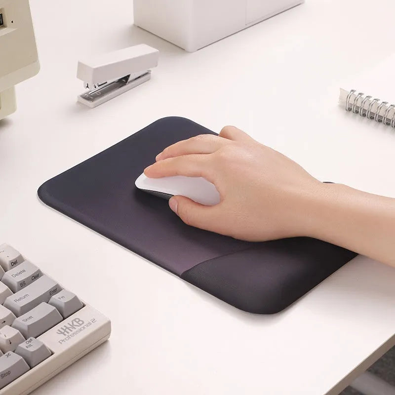 Square silica gel wrist rest mouse pad with cloth surface in colour options of black, blue, pink, or purple